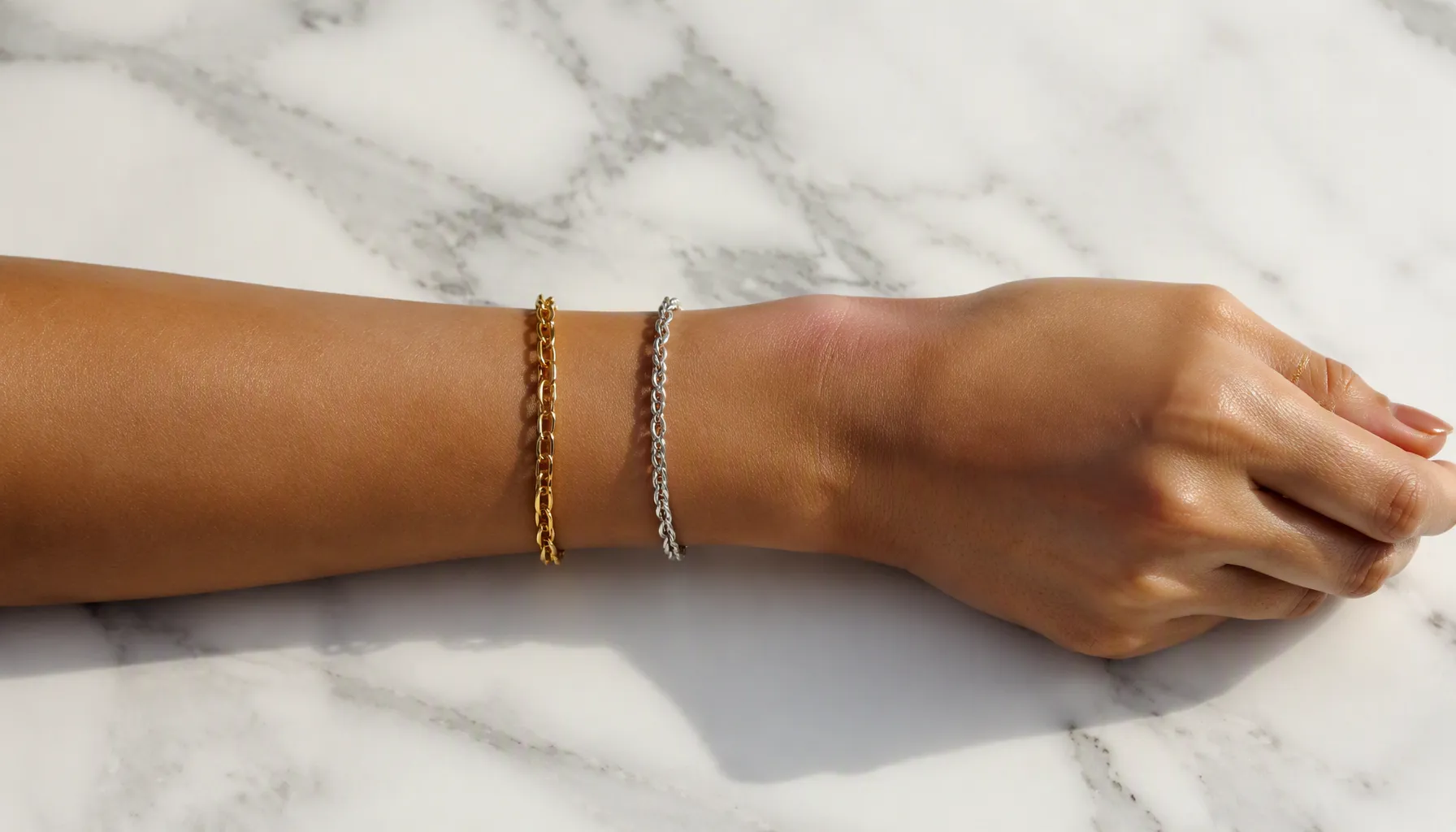 Gold and silver jewellery metal test on wrist to determine warm or cool skin undertone