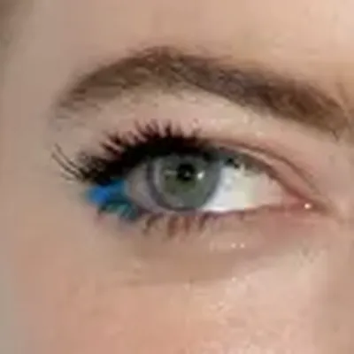 Emma Stone's eyes — warm hazel-green, vivid Spring quality