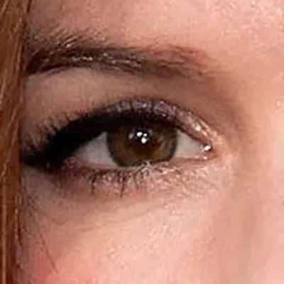 Isla Fisher's eyes — vivid warm green, intensely Bright Spring