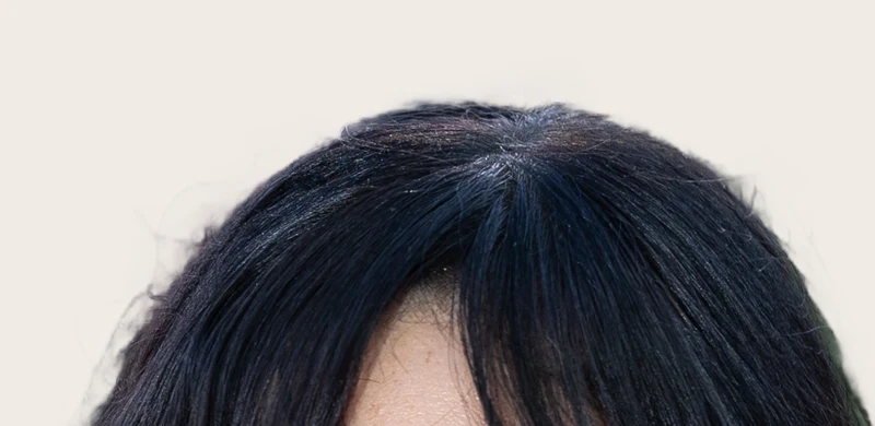 Jenna Ortega's hair — very dark warm brown, near-black