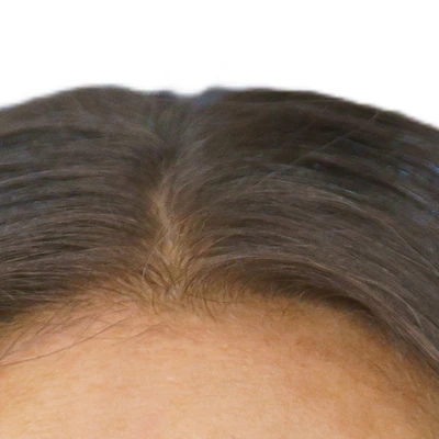 Natalie Portman's natural hair — warm chestnut medium-brown