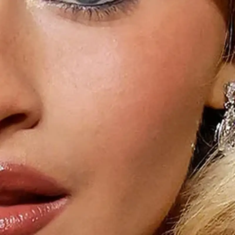 Sabrina Carpenter's skin tone — light porcelain with warm peachy undertone